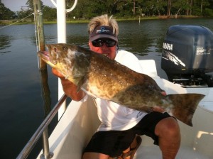 capt-pete-with-a-very-nice-bay-grouper-when-the-season-was-open-back-in-june 6942296257 o